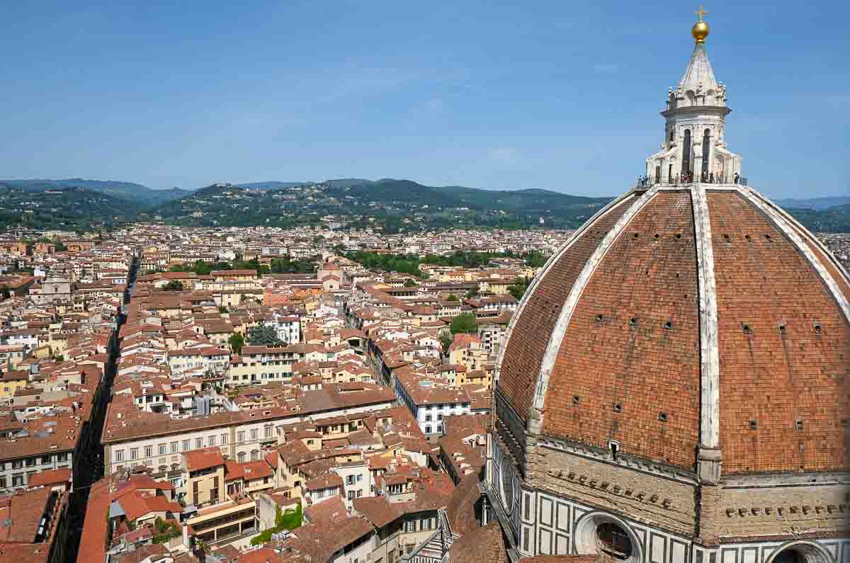 red dome of florence cathedral with red roofs of city below