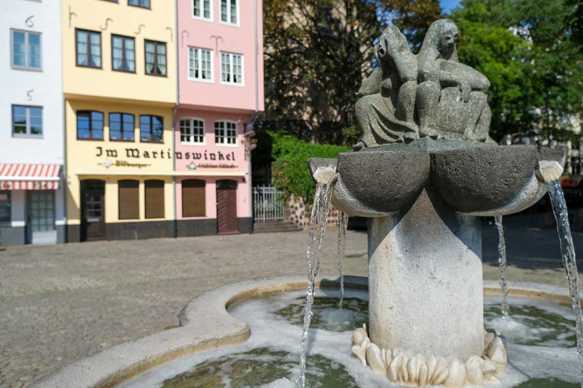 fountain in small square in old town cologne