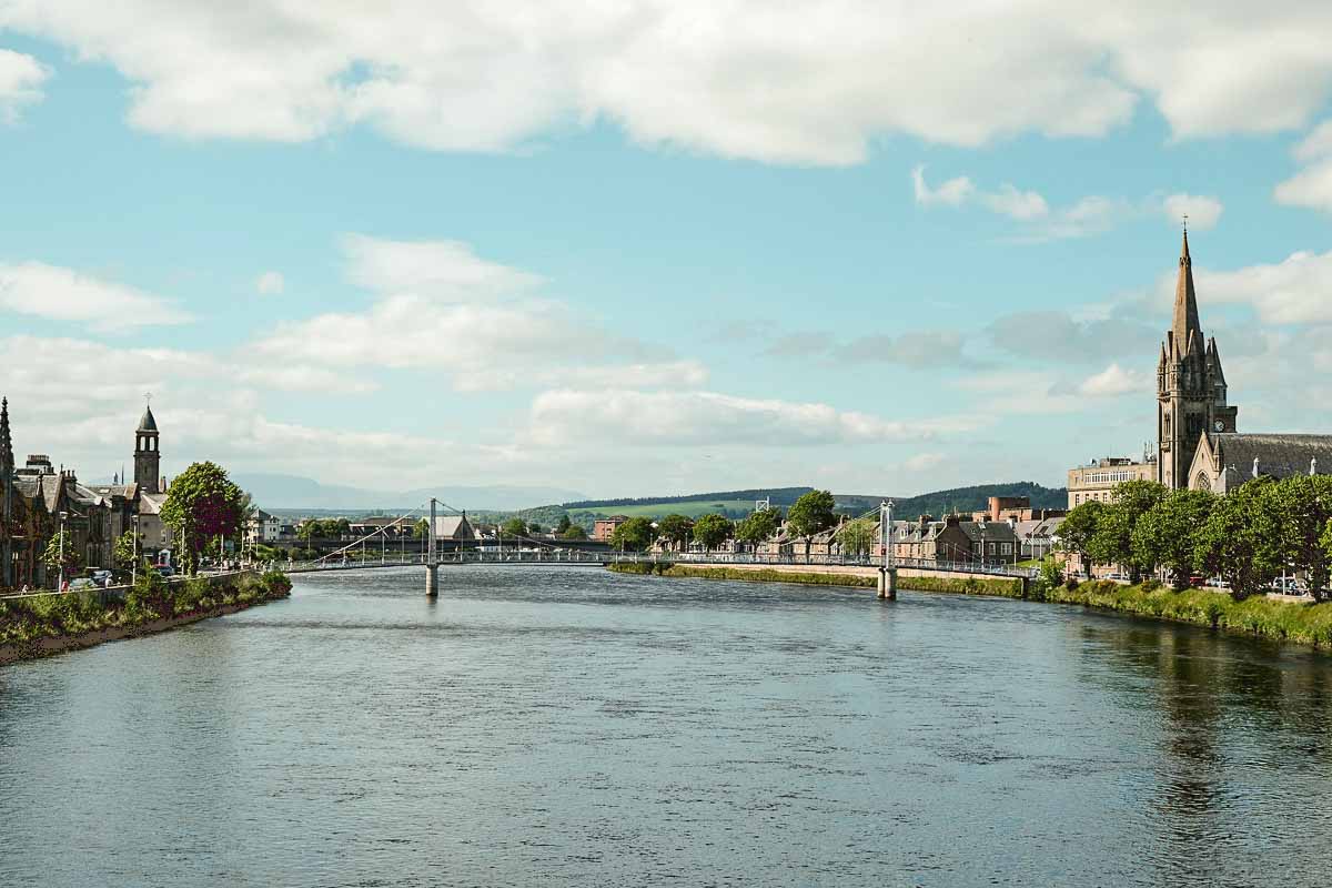 My Travelodge Inverness City Centre Review 1 wide river in inverness in scotland with bridge and lined by buuildings