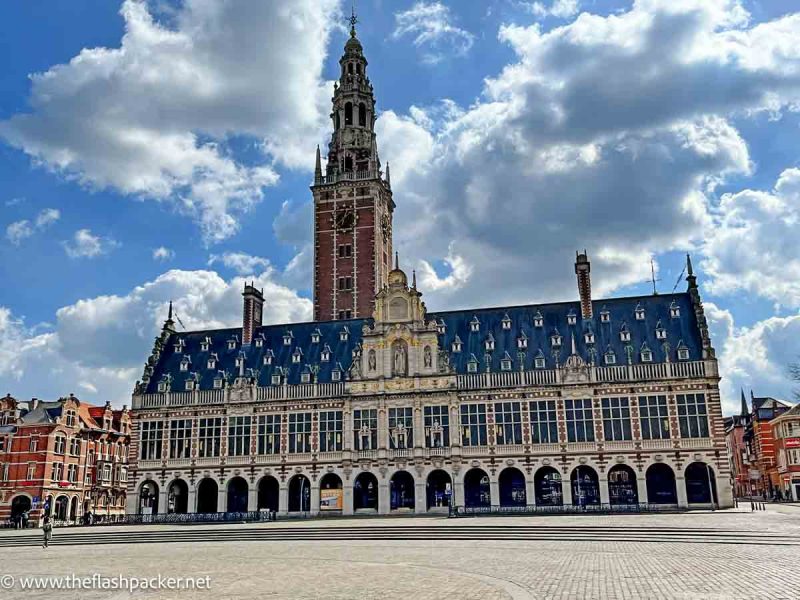 ornate exterior of the library of leuven university with bell tower