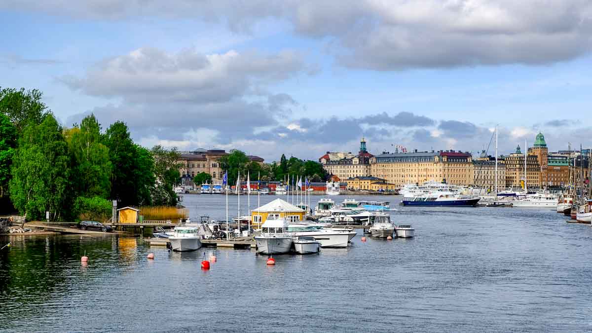 One Day in Stockholm from a Cruise Ship: An Itinerary That Works 1 rover with boats and buildings on bank seen during one day in stockholm