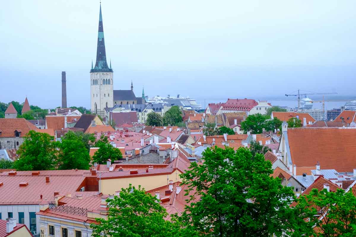 Estonia 2 red roofs of tallinn with church spire and cruise ship in distance