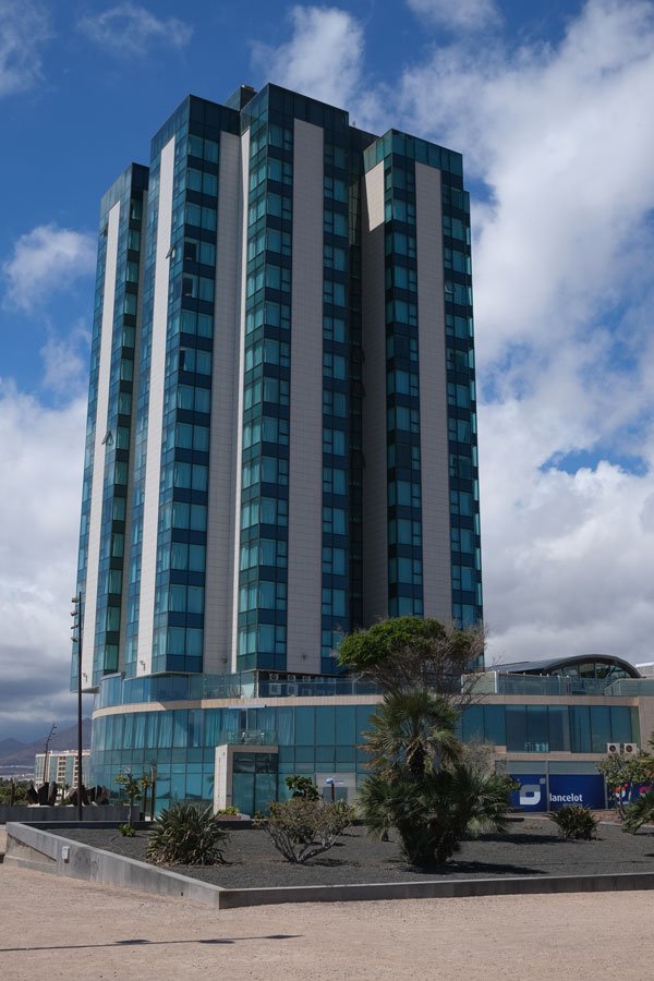 high rise building housing a hotel