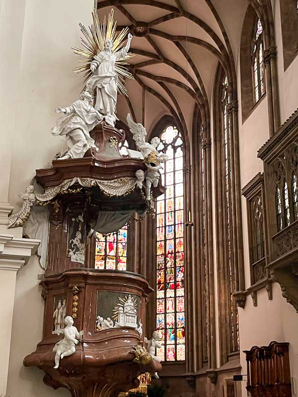 carved wooden pulpit in cathedral of st peter and st pail in brno