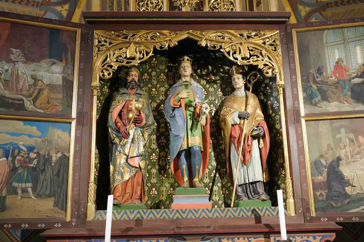 small altar with three painted figures