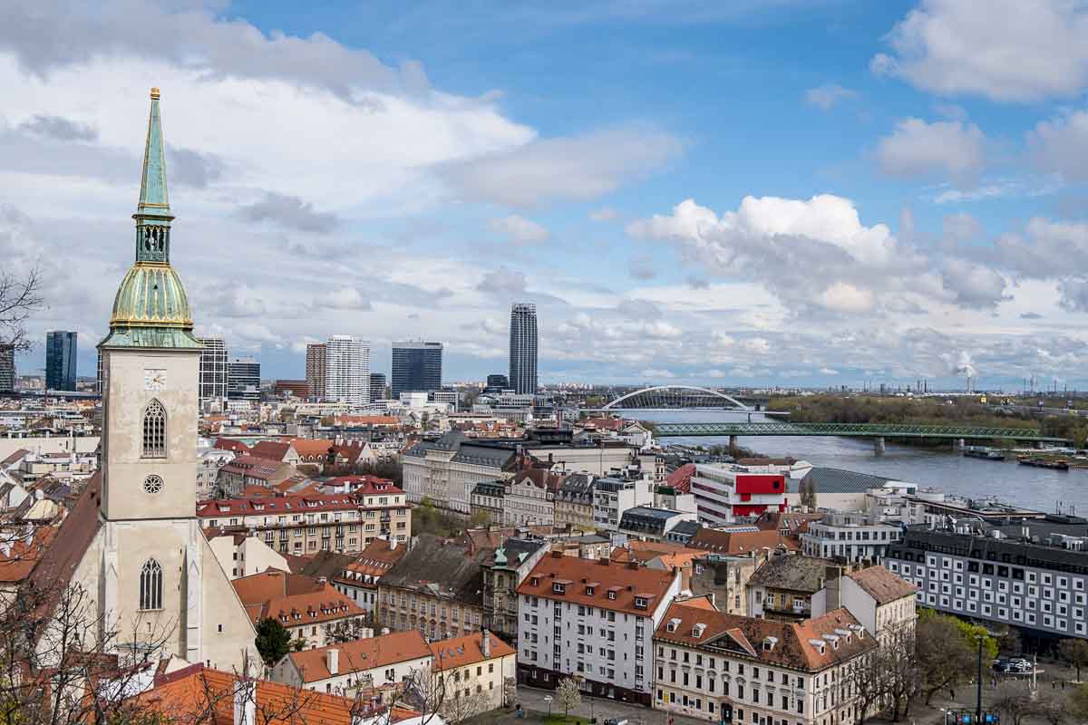 Is Bratislava Worth Visiting? 15 Reasons to Say “Yes”! 1 panoramic view of bratislava with cathedral clock tower in foreground