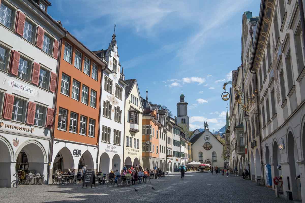 Top 10 Things to Do in Feldkirch: An Austrian Medieval Gem 1 a long narrow medieval market square in feldkirch austria with ornate fountain