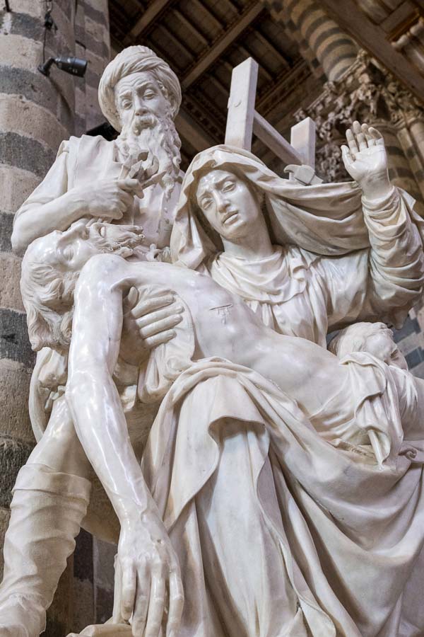 marble statue of the pieta in orvieto cathedral