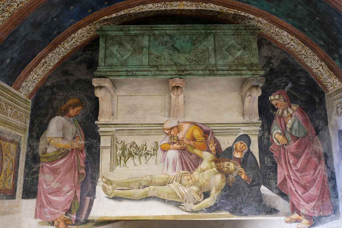 fresco of pieta scene with mary cradling body of dead jesus