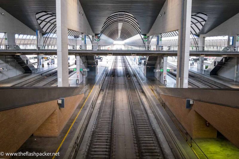 looking down on to platforms in huge railway station