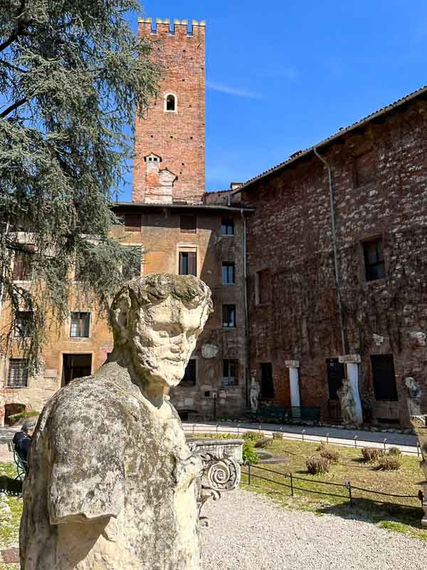 weathered stone sculpture outsdie vicenza olympic theatre